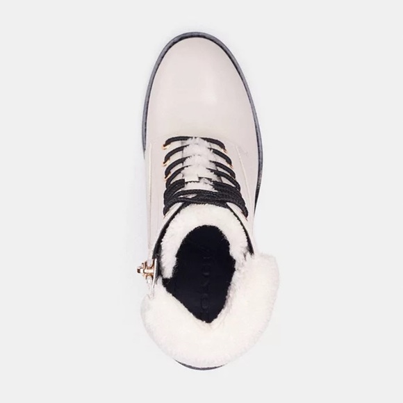 Leather and faux shearling upper
Man-made leather lining and footbed - Picture 2 of 4